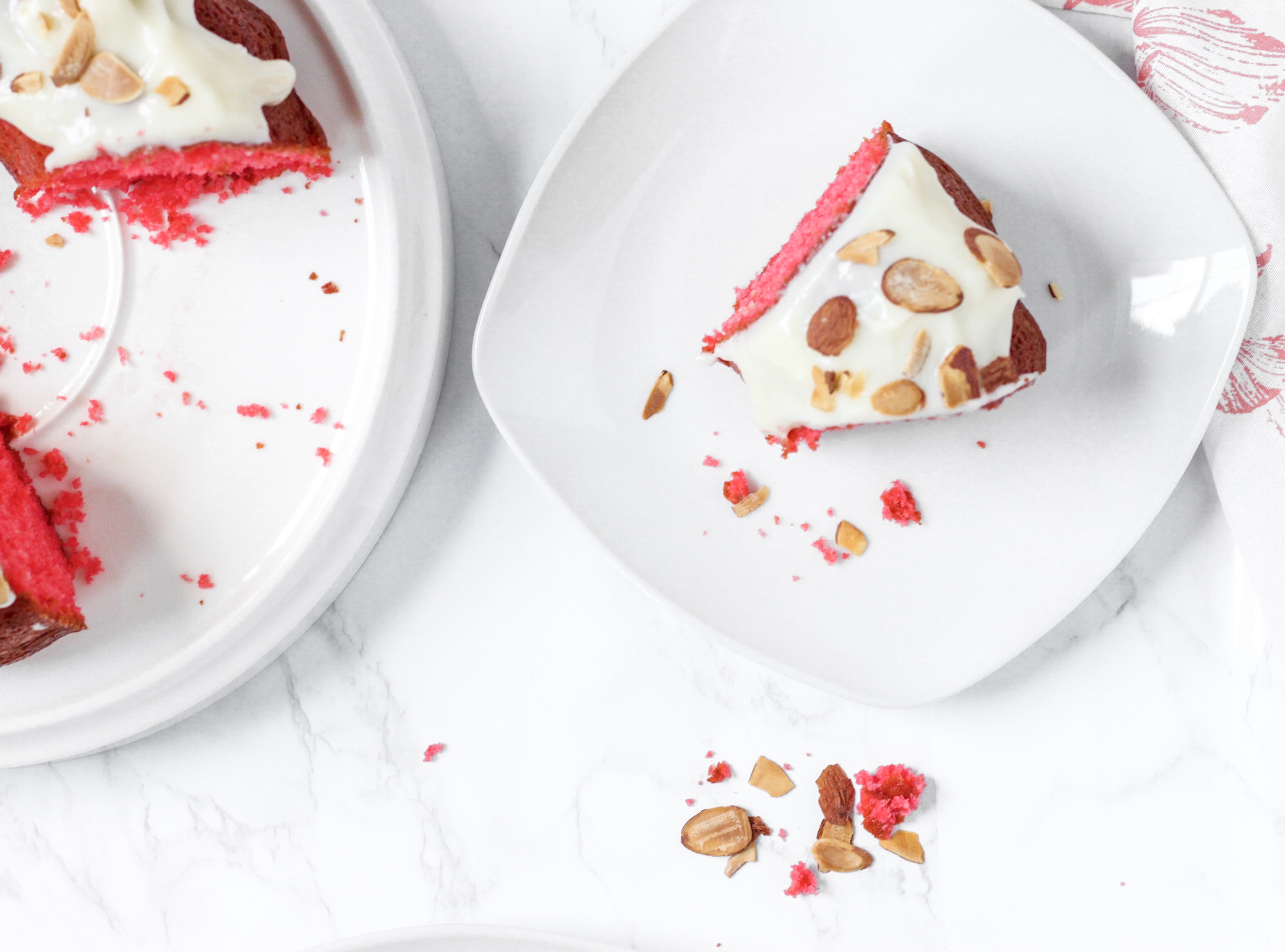 Overhead shot of the cake slice with crumbs on the table.