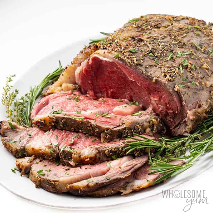 prime rib with rosemary sprigs