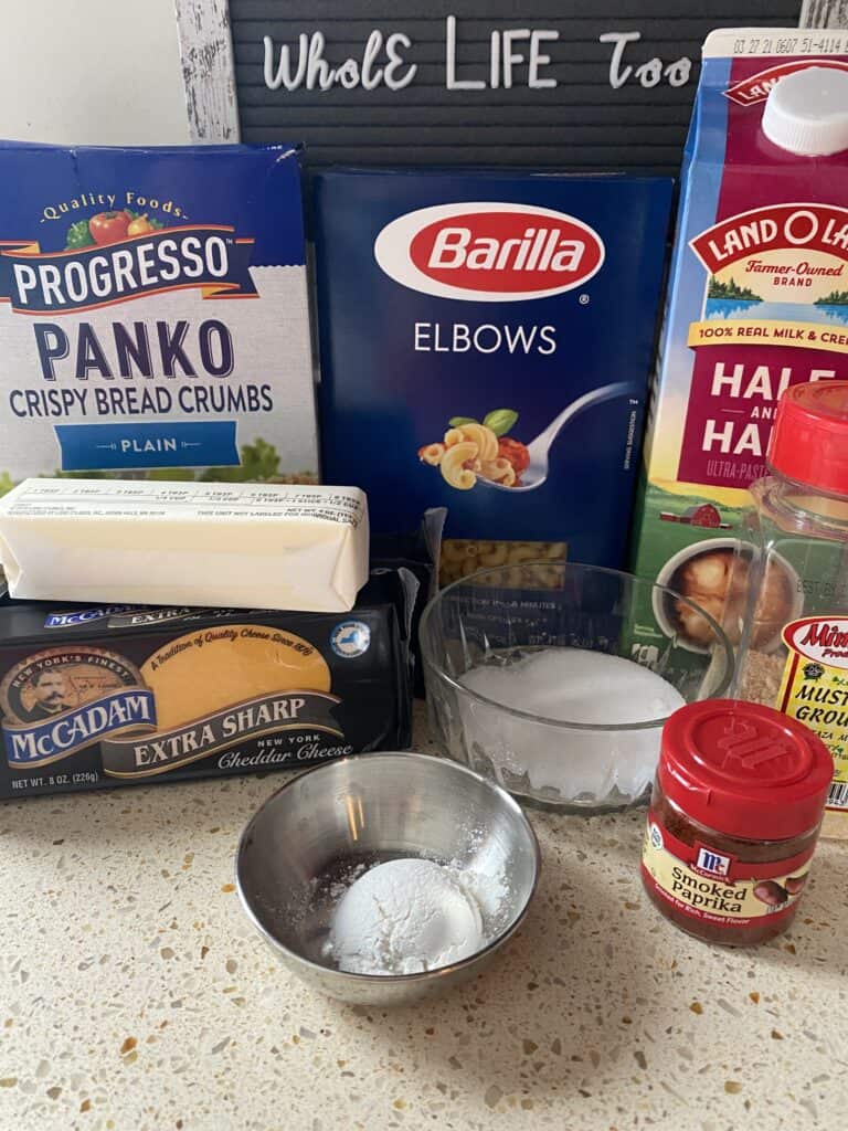 ingredients for the baked mac and cheese: Panko, butter, extra Sharp Cheddar cheese, flour, salt, smoked paprika, ground mustard, half & half, elbow macaroni. 