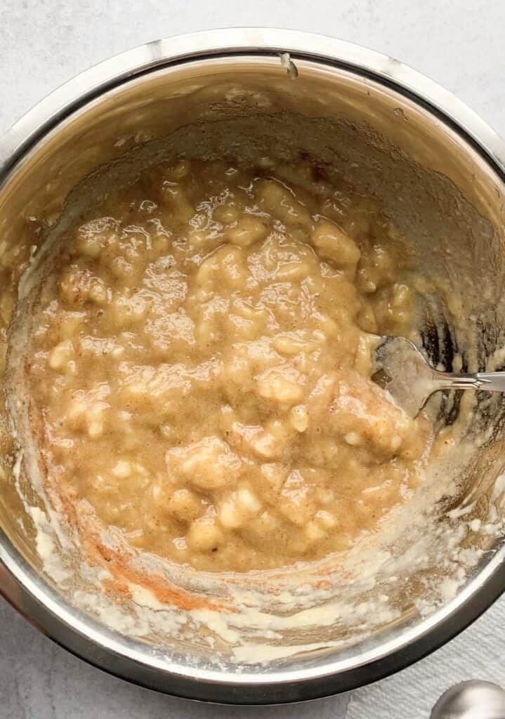 the mashed bananas in a silver bowl