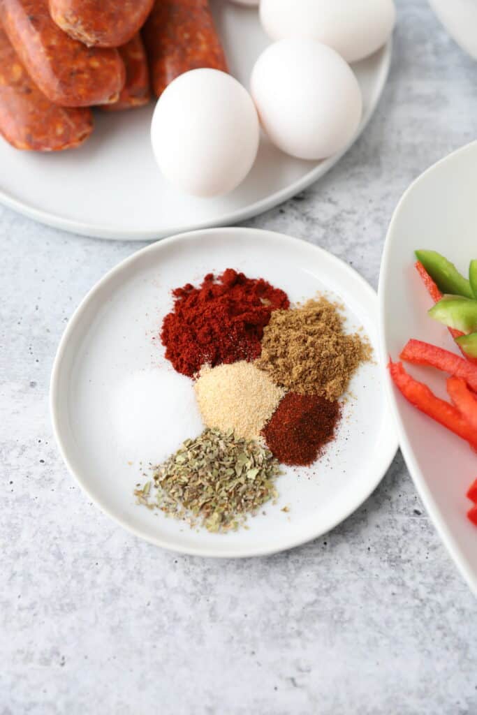 close view of the spices on a white plate