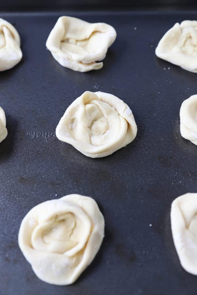 the raw danish on a baking sheet.