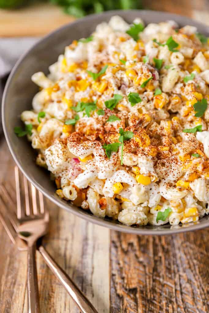 close shot showing the macaroni noodles sprinkled with extra chili powder.