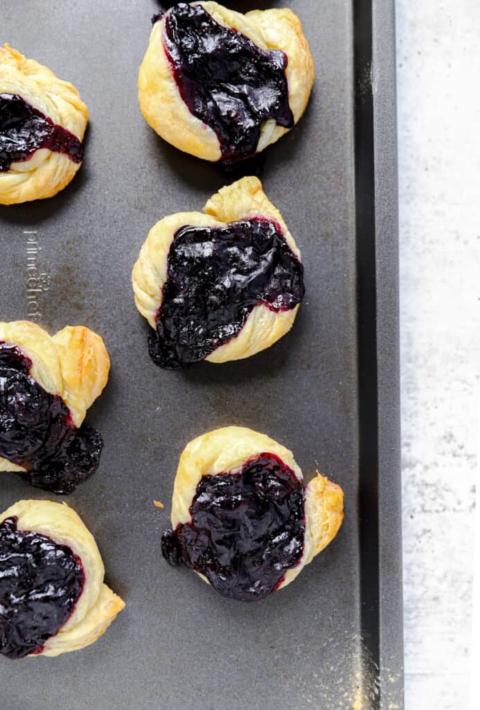 overhead shot of the cooked Danishes on the baking sheet.