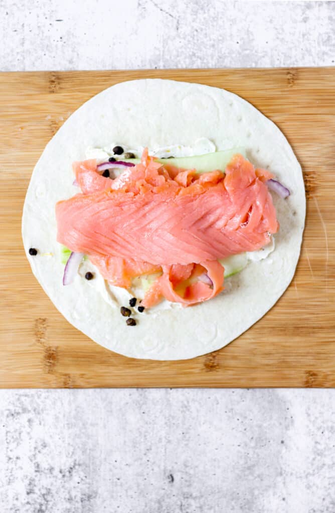 overhead shot of the assembled smoked salmon wrap before wrapping it.