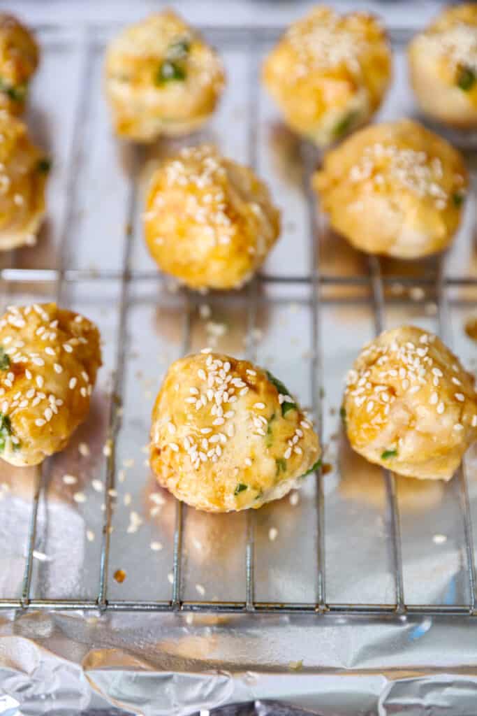 close shot of the chicken meatballs on the baking rack before placing in the oven.