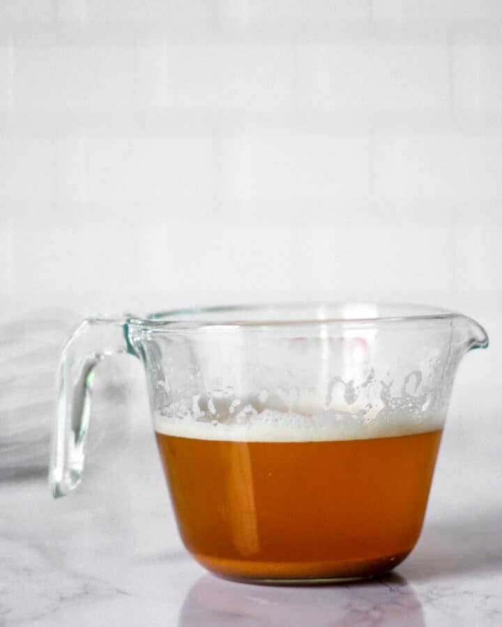 brown butter in a glass measuring cup