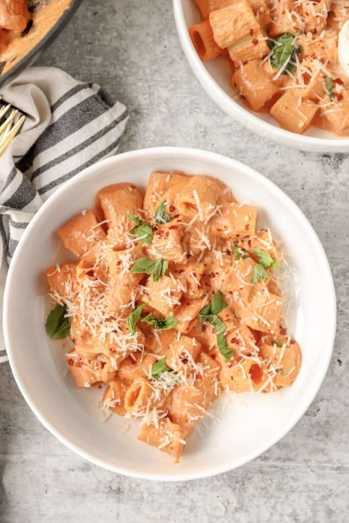 overhead photo of the spicy rigatoni vodka in a round white bowl.