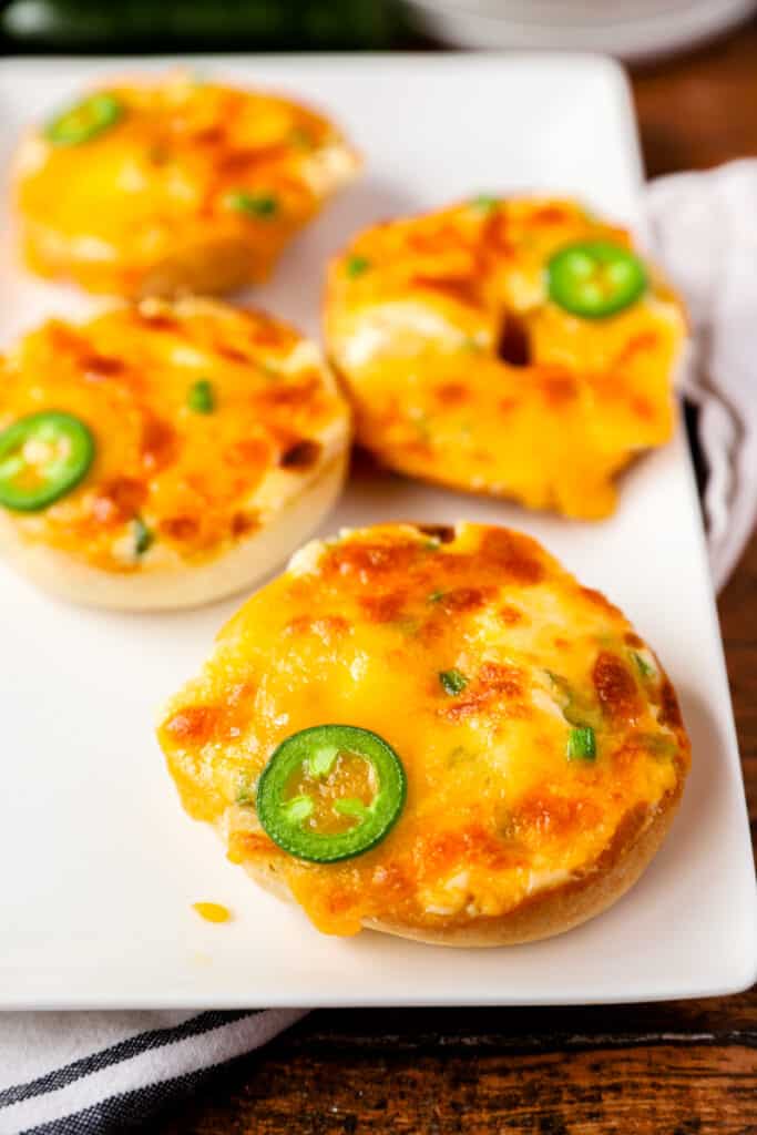 the baked jalapeno bagels on a white platter