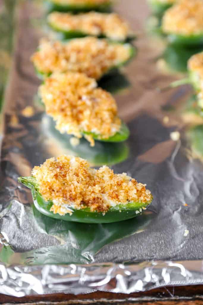the unbaked but filled jalapeno popper on a foil lined baking sheet.