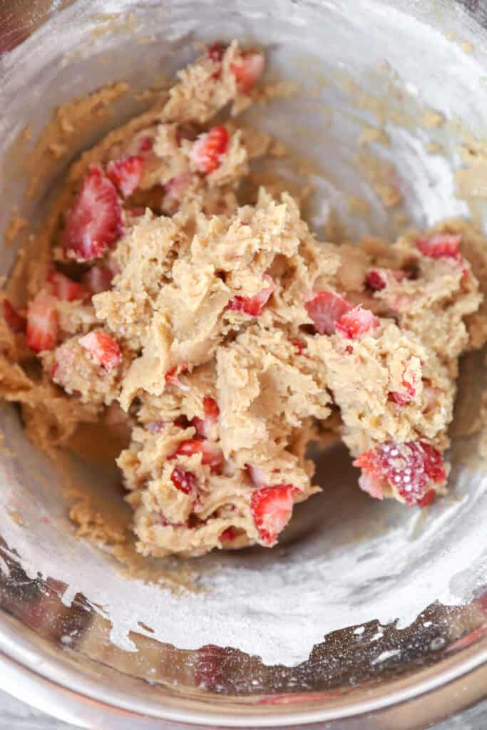 the brown sugar strawberry dough in a stainless steel bow.