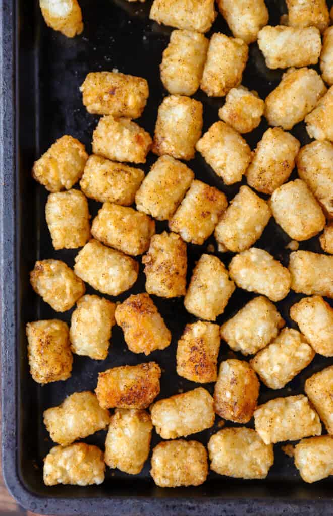 overhead view of the baked tater tots on a baking sheet.