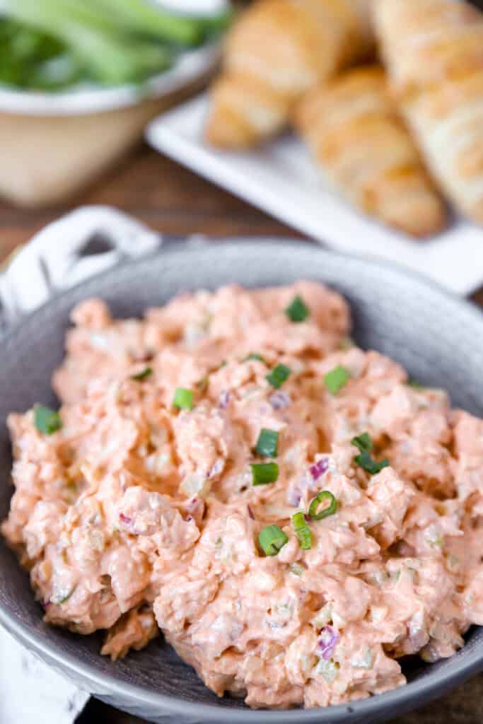 the mixed Buffalo chicken chicken salad in a round grey bowl.