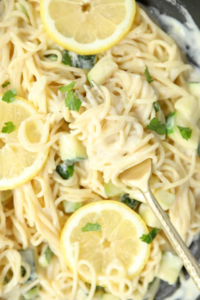 a fork with noodles of the lemon zucchini pasta