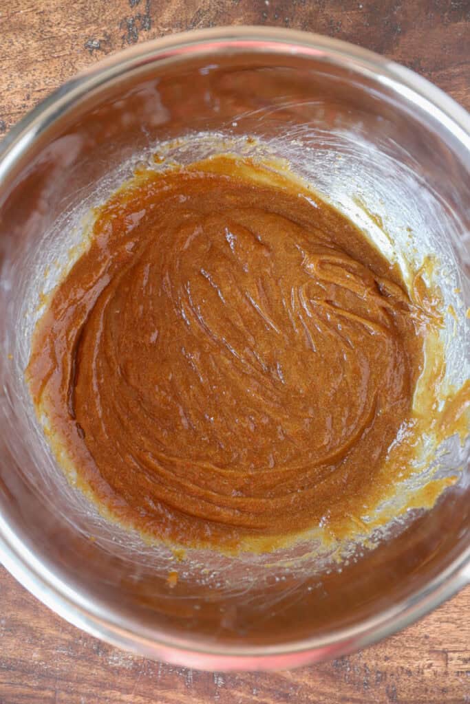overhead photo of the pumpkin batter in a stainless steel bowl.