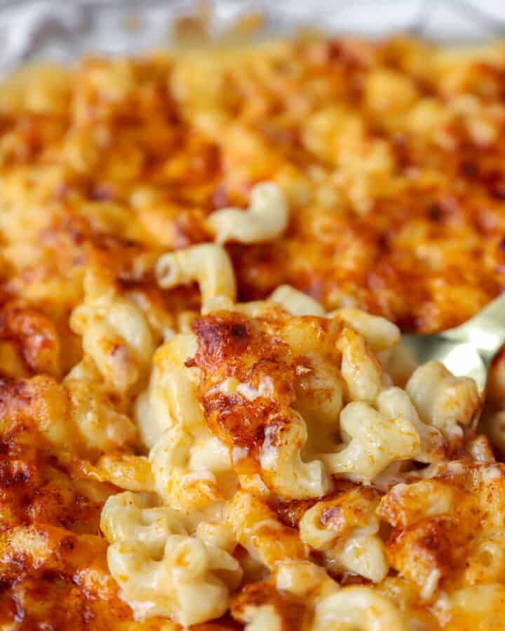 overhead photo of spoon scooping the mac and cheese.