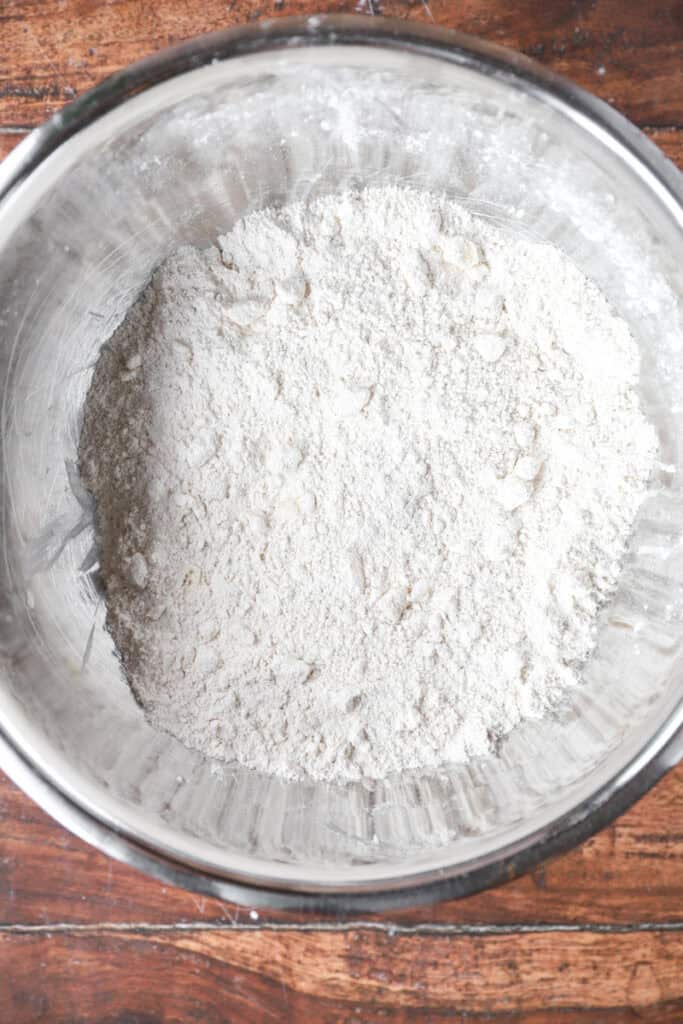 overhead photo of the dry ingredients in a stainless steel bowl.