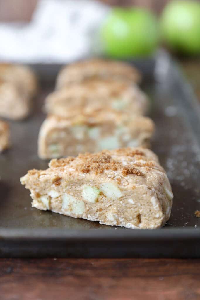 the sliced unbaked scone on a baking sheet.
